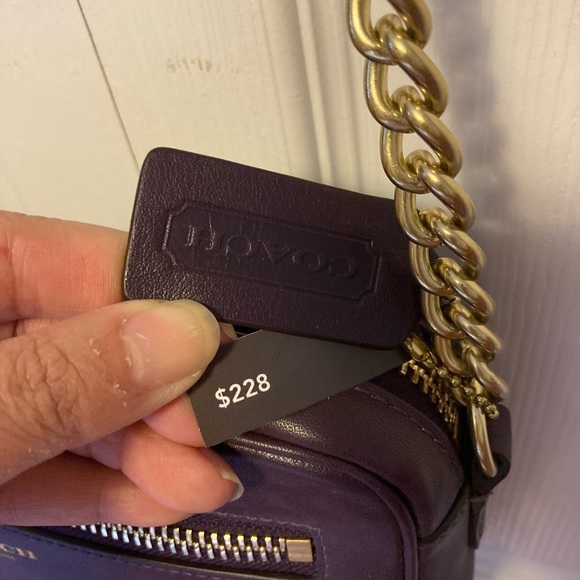 Brand new beautiful plum colored coach crossbody. - Picture 4 of 5